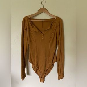Free People body suit- rust orange